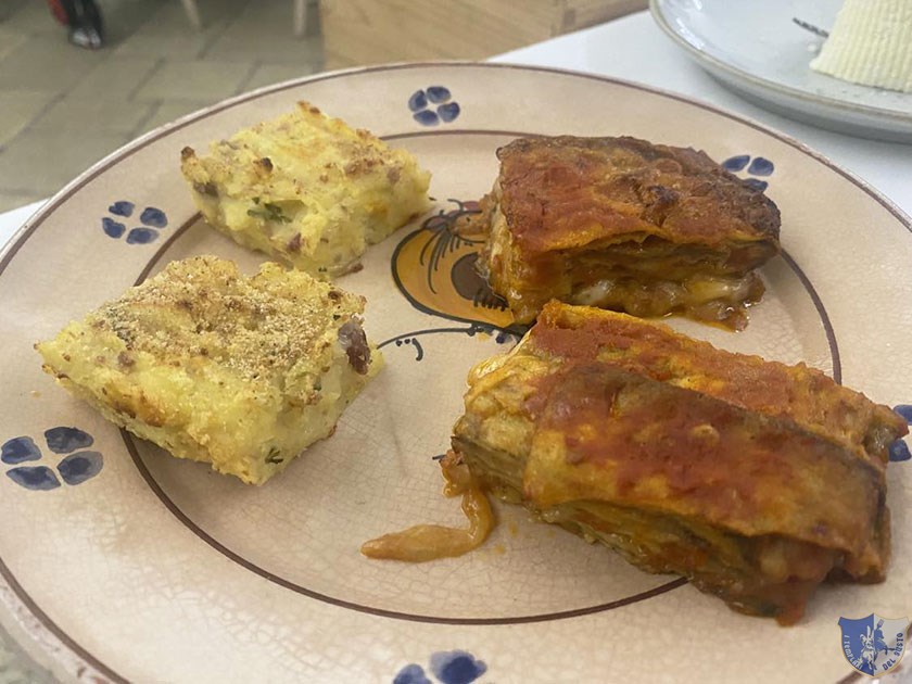 Parmigianina di melanzane e pizza di patate