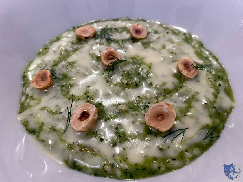 Risotto al pesto di erbette Castelmagno e nocciola