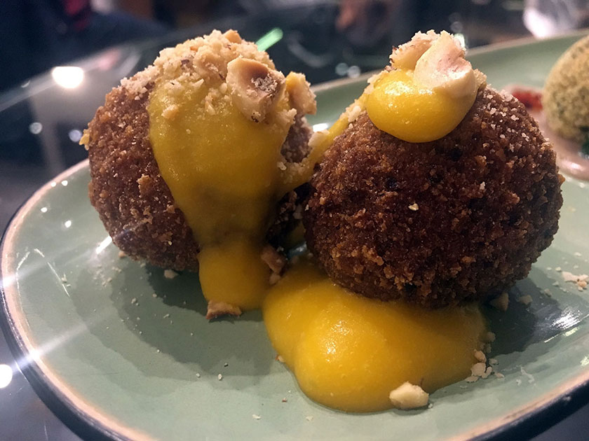 Polpette di funghi porcini e patate crema di taleggio su crema di zucca e nocciole tostate